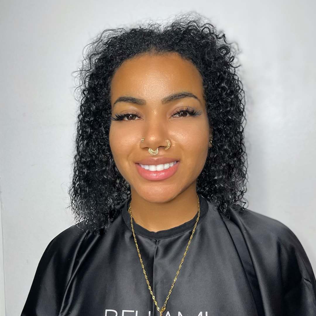 Completed look of curly hair with luxury extensions for added length