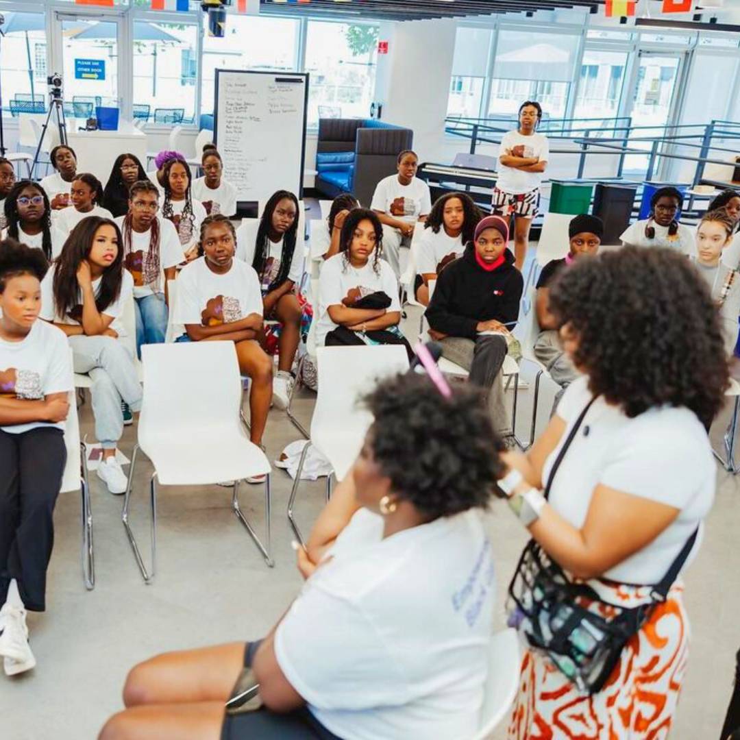 curly hair salon workshop, the talking in a team.